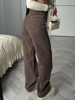 95% cotton, 5% spandex Care instructions: Machine wash cold wide-leg jeans in Brown with flared silhouette