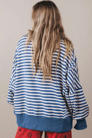 white sweatshirt with hip-length and half-button