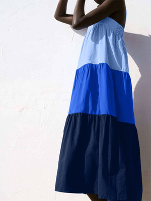 Three-tone wide strap dress with tiered skirt in light blue, royal blue, and navy.
