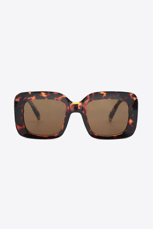 Tortoiseshell rectangular sunglasses with textured arms and brown lenses.