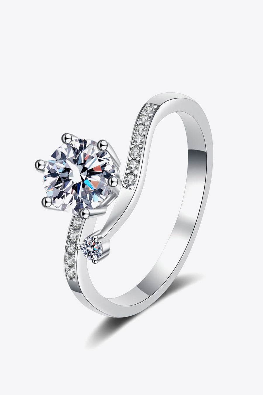 Silver bypass ring with moissanite and pavé diamond accents