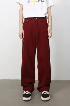 Burgundy wide-leg denim trousers with a relaxed fit.