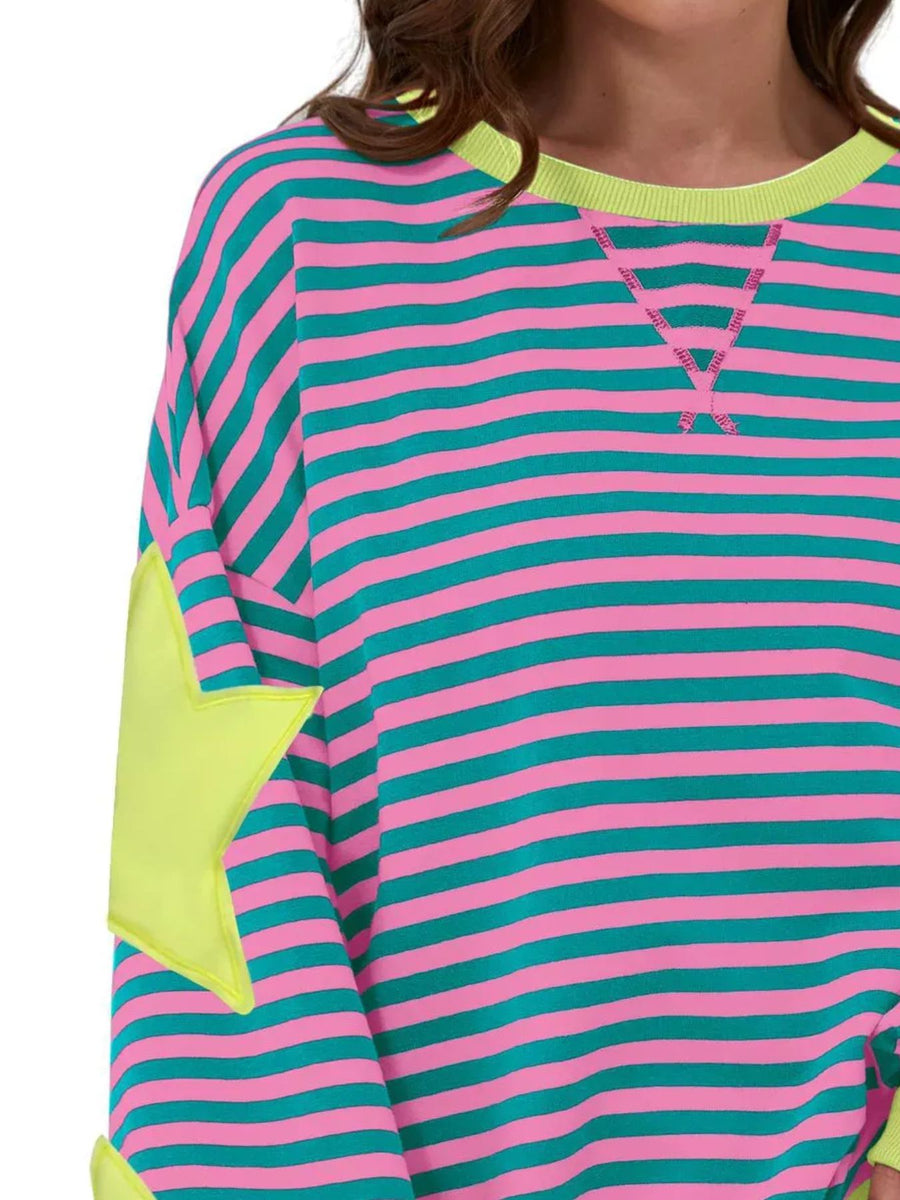 teal green sweatshirt featuring seam detail and striped