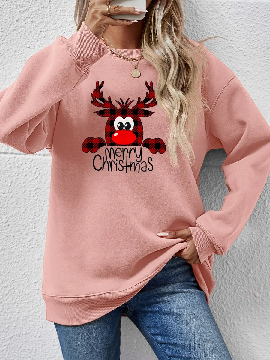 Plaid reindeer graphic crewneck sweatshirt in blush pink with Merry Christmas text.