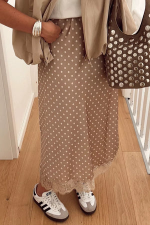 midi skirt in tan featuring lace detail and flared fit