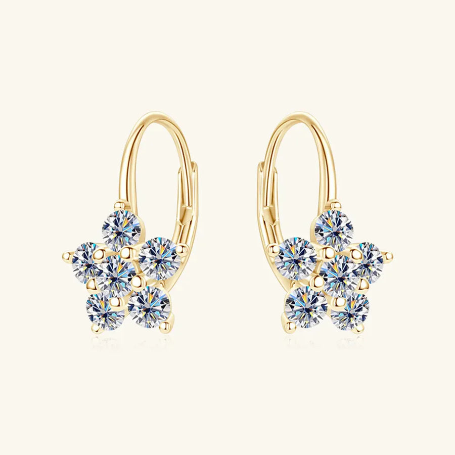 Gold celestial cluster huggie hoop earrings with clear cubic zirconia stones.