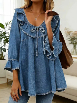 blouse in medium wash denim featuring ruffled and A-line fit