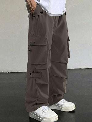 Brown cargo pants with multiple pockets and drawstring detail.
