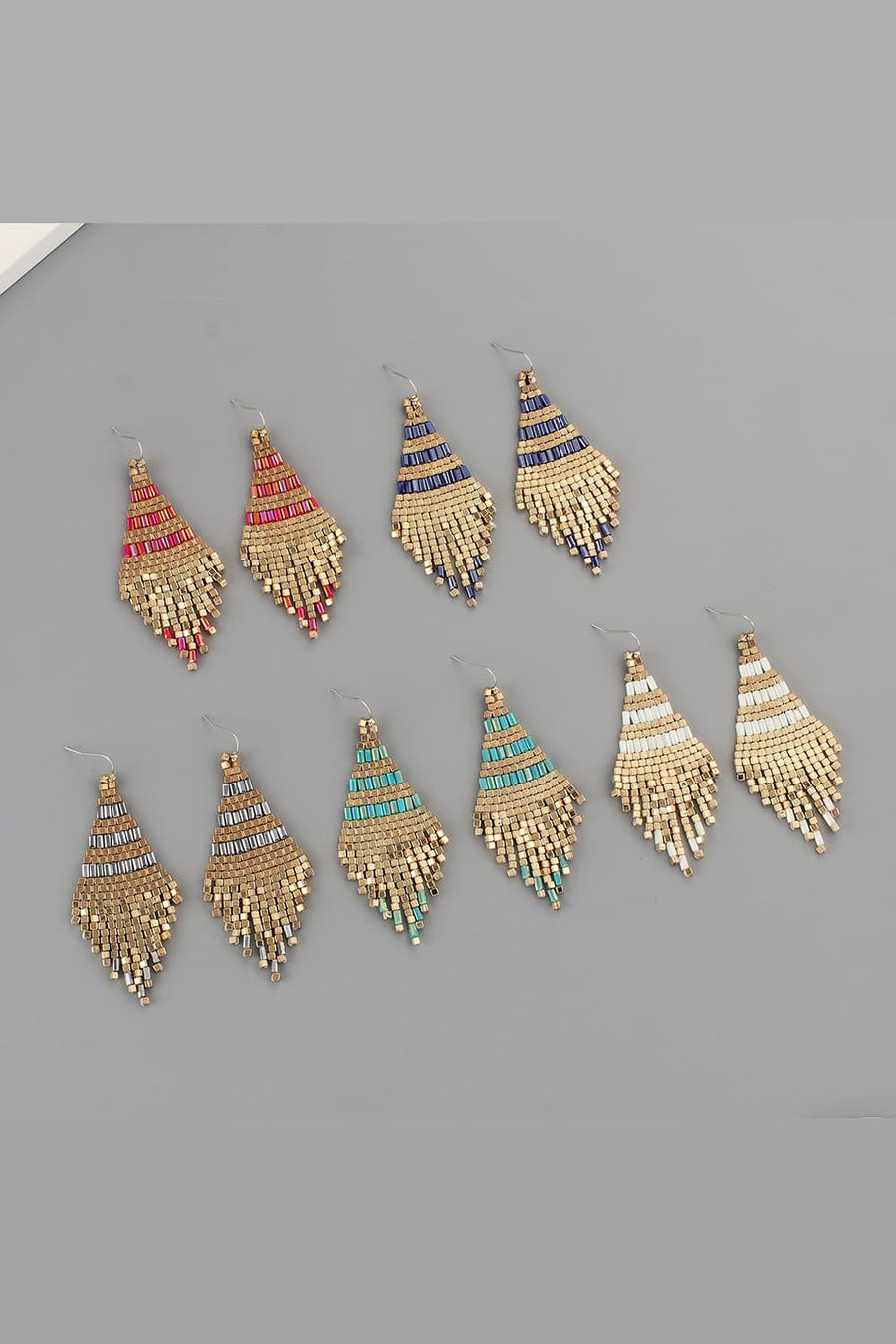 Geometric beaded fringe earrings with gold accents and red, blue, turquoise, or white beads.