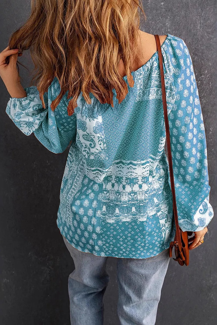 blouse featuring paisley in cream with 100% polyester Care instructions: Machine wash cold texture