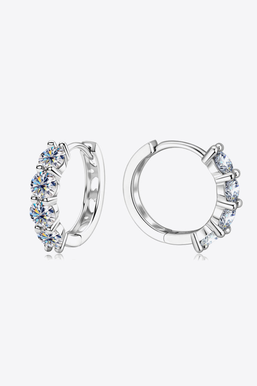 Silver pavé crystal huggie earrings with multiple round cut stones.
