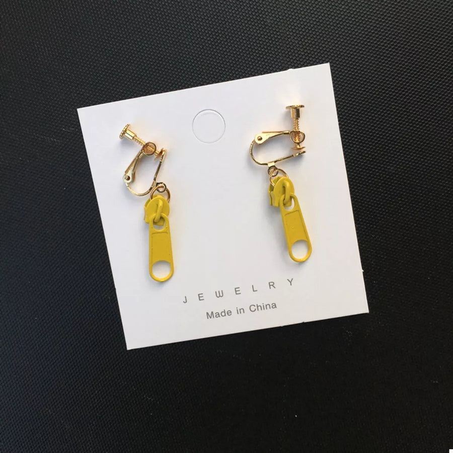Yellow zipper dangle clip-on earrings with gold-tone hardware