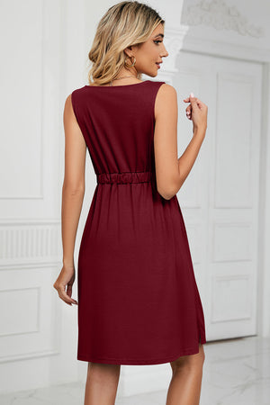 Burgundy a-line summer dress with elastic waist and sleeveless design.