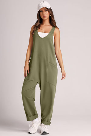 Relaxed fit jumpsuit in Matcha Green with oversized pockets and cuffed ankles.