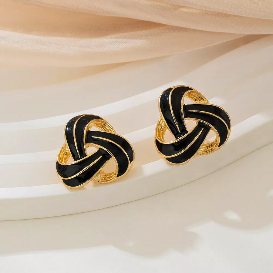 gold earrings featuring gold-plated and geometric