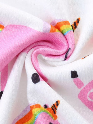 White girls' undershirt with pink unicorns and rainbow horns, black polka dots.