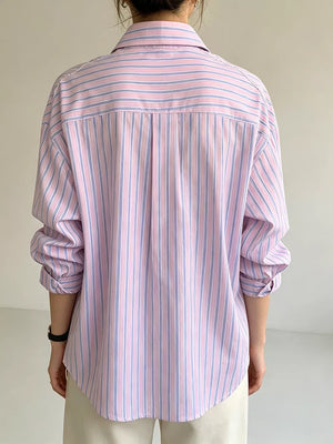 Blue button-down shirt with button-front and striped