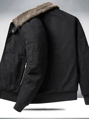 Black bomber jacket with plush sherpa collar, zip pocket and ribbed cuffs.