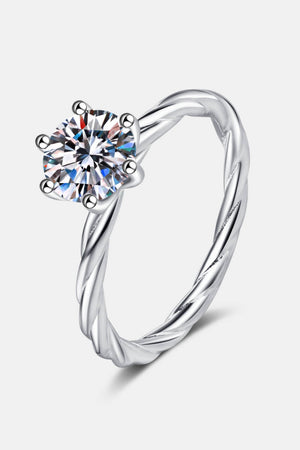 Silver twisted band moissanite solitaire ring with six prongs