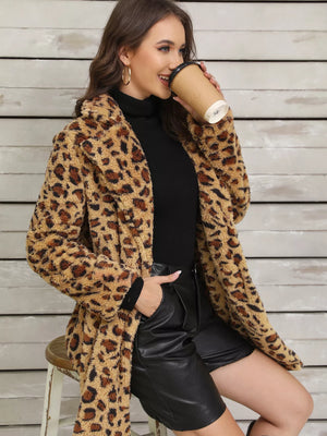 Cozy fuzzy teddy wrap coat in leopard print with a shawl collar.