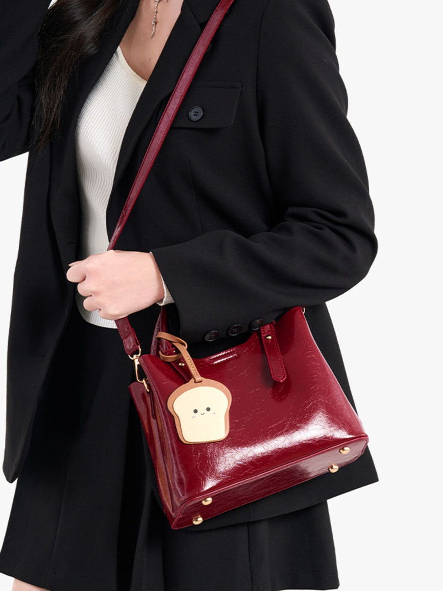 PU Leather Imported Size & handbag in Wine Red with structured silhouette