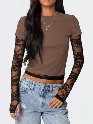 Brown cropped t-shirt with black lace sleeves and fingerless gloves.
