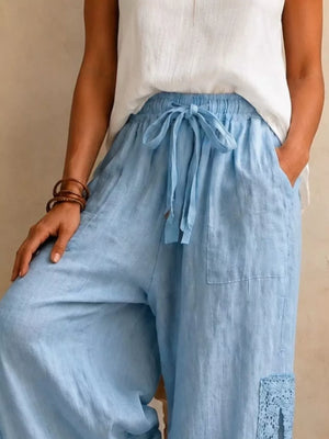 100% polyester Care instructions: Machine wash cold wide-leg pants in Light Blue with flared silhouette