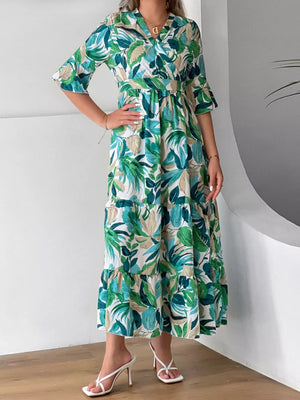 emerald green midi dress featuring tiered and floral