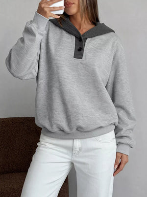 100% polyester Care instructions: Machine wash cold pullover hoodie in charcoal with relaxed silhouette
