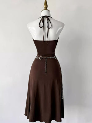 golden mini dress featuring slit and sun motif
