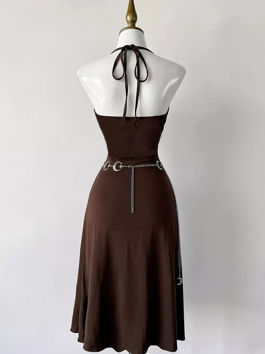 golden mini dress featuring slit and sun motif