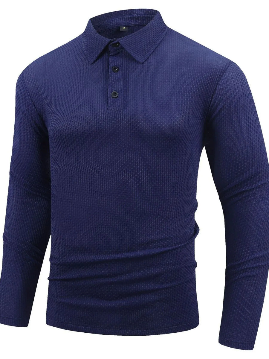 Navy textured long sleeve polo shirt with buttoned placket and articulated sleeves.
