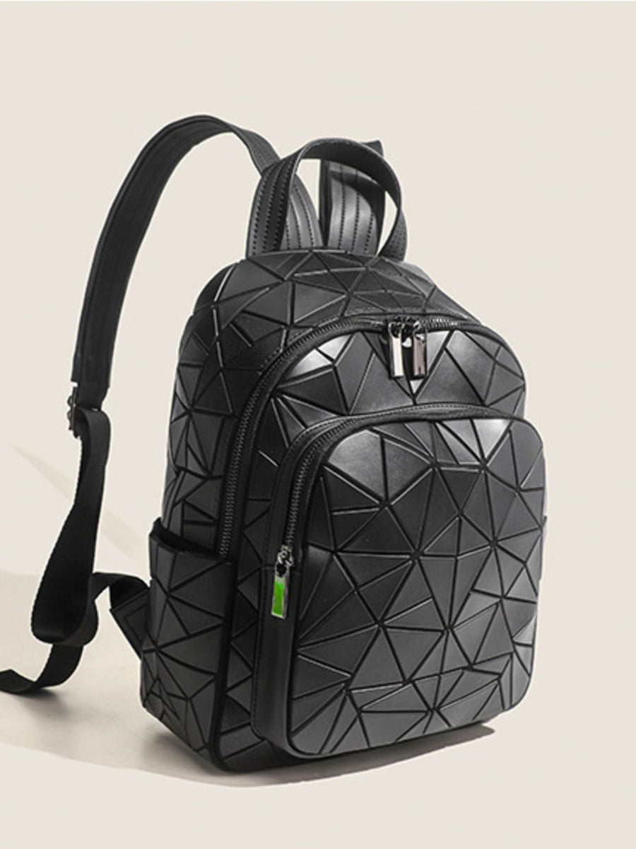 Black backpack featuring front zip pocket and geometric
