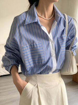 100% polyester Care instructions: Machine wash cold button-down shirt in Blue with relaxed silhouette