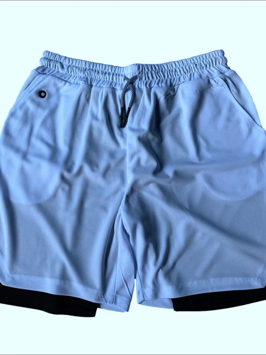 Blue dual-layered performance shorts with black trim and phone pocket detail.