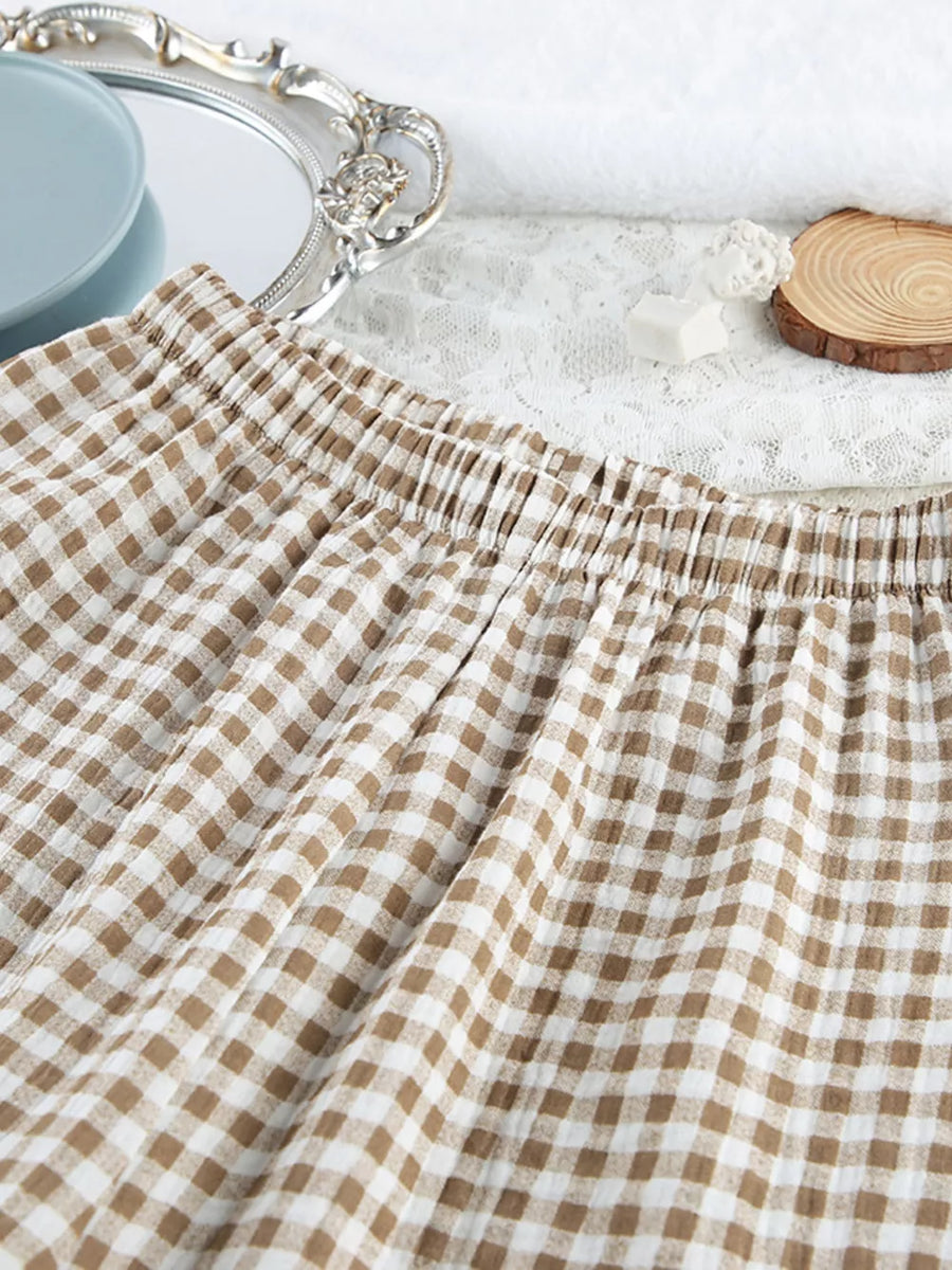 Khaki pajama set with hip-length top, full-length pants and button-front, elastic