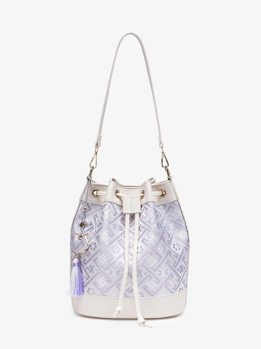 crossbody bag featuring geometric in White with PU Leather Imported Size & texture