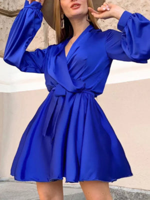 champagne fit-and-flare mini dress with deep v-neck
