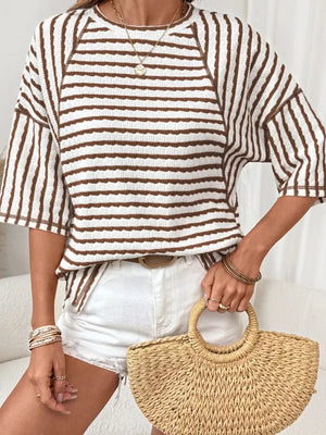 black t-shirt featuring seam detail and striped