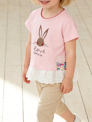 Pink cotton tee with bunny graphic, lace trim, and ruffled hem.