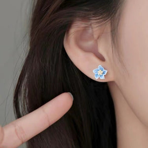 yellow earrings featuring floral design and floral