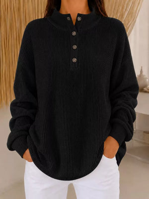 100% polyester Care instructions: Machine wash cold sweatshirt in Black with relaxed silhouette