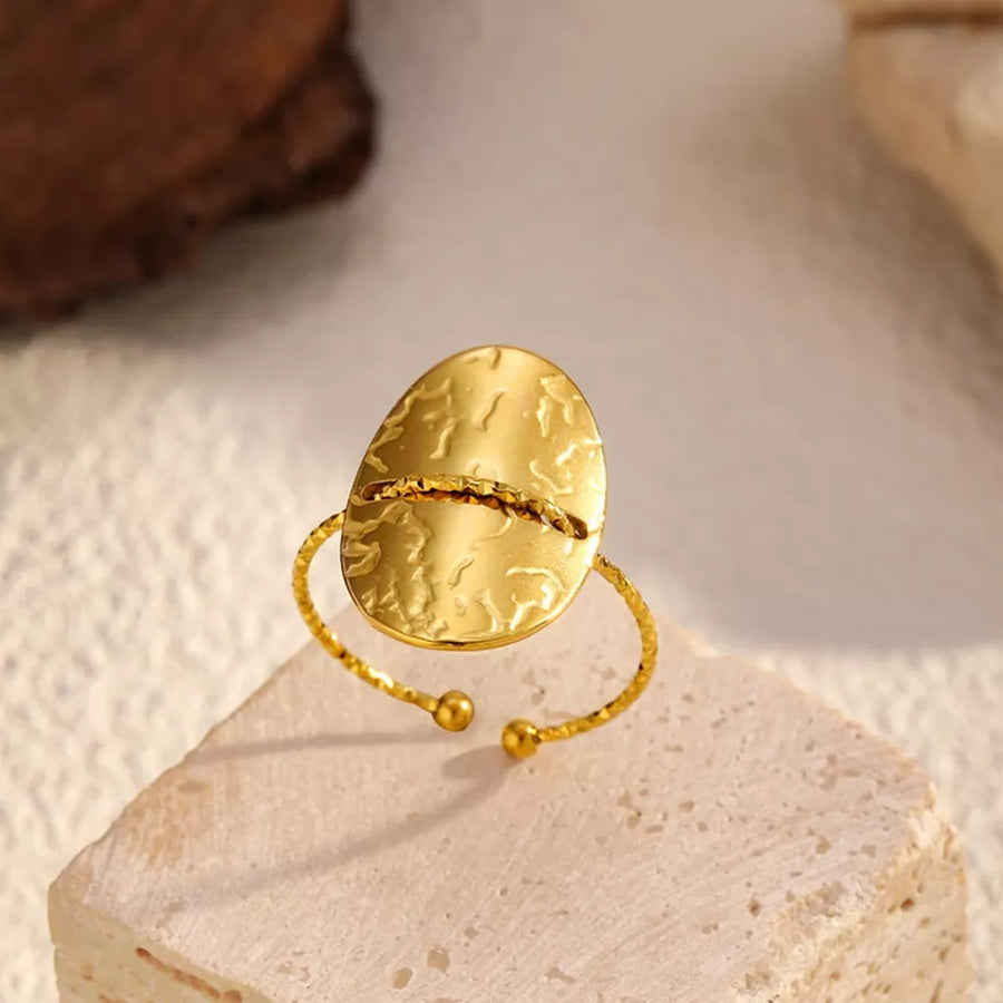ring in gold with hammered texture and hammered texture