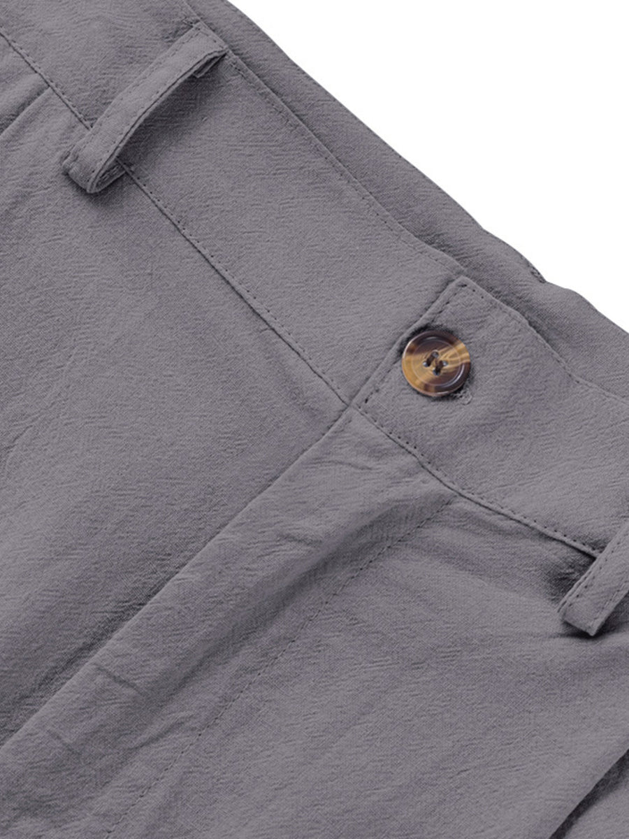 Grey relaxed fit sweatpants with button closure and belt loops.