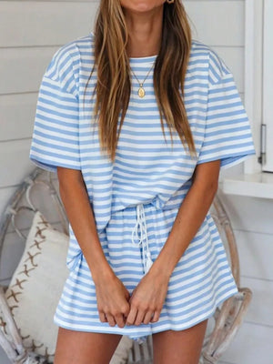 Blue and white striped tee and drawstring shorts set with tassel detail.