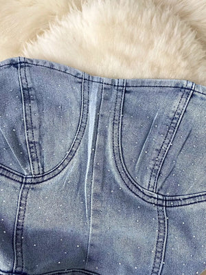Blue denim bustier bodysuit with allover rhinestones and corset seams