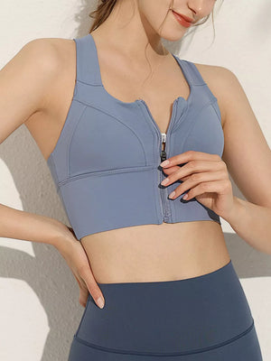 athletic tank in dusty blue featuring crisscross and fitted fit