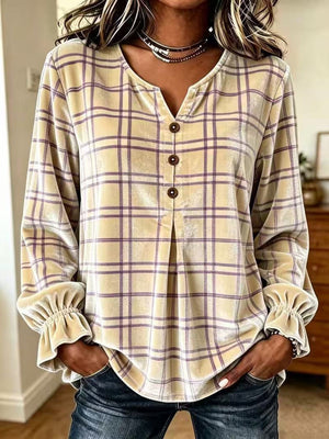 light yellow blouse with plaid and v-neck