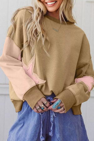 65% polyester, 35% cotton, Care instructions: Machine wash cold sweatshirt in Tan with oversized silhouette