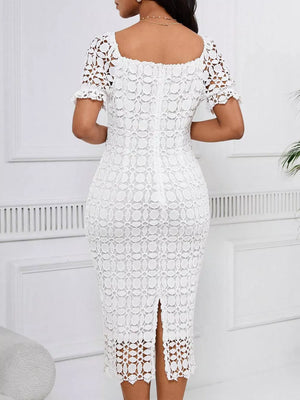 White lace midi dress with short sleeves, square neckline, and a slit.